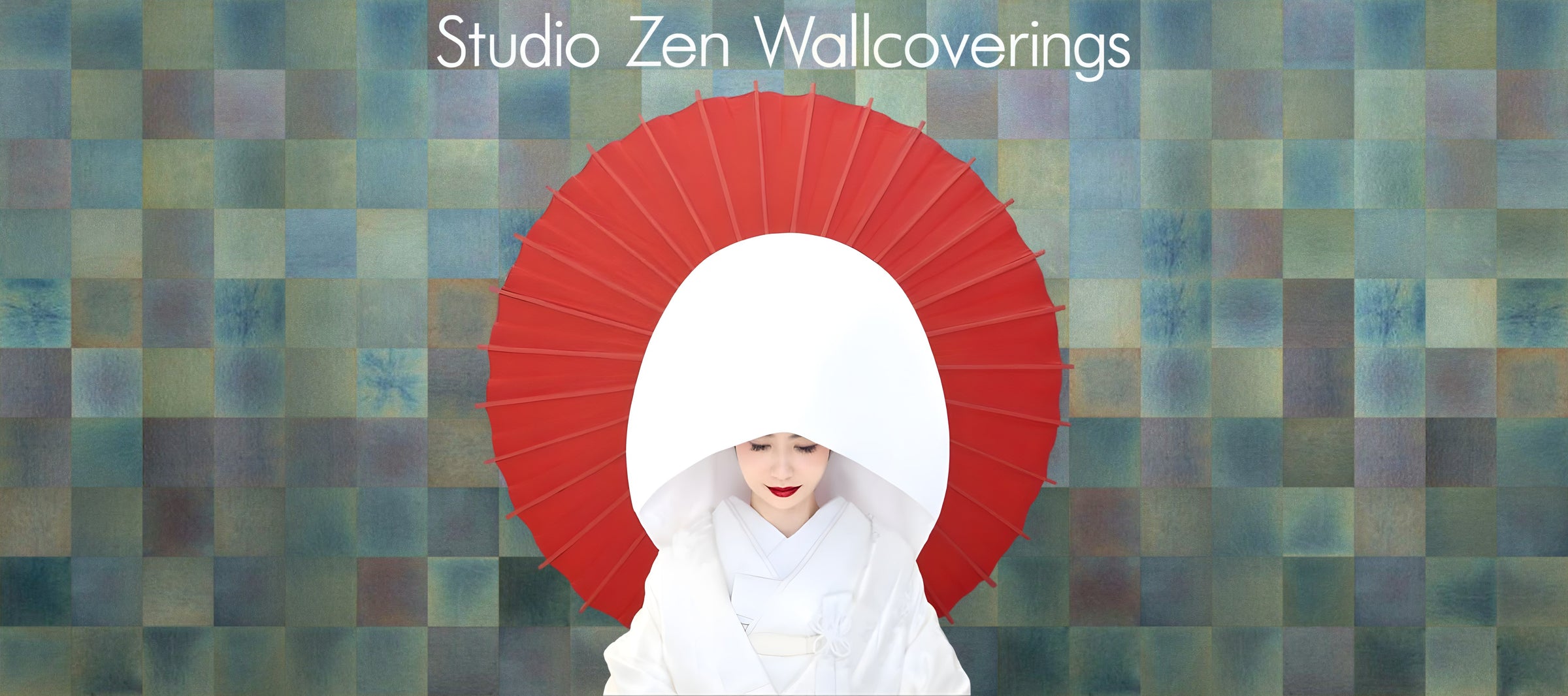A bride in a white wataboshi hood beneath a red parasol, against a wall of hand-dyed blue and green squares