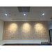 Abstract Art SZT-0139 on the wall behind a gym front reception desk, lit by three spotlights